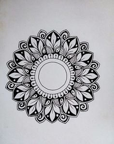 a black and white drawing of a flower with leaves on the center, surrounded by circles