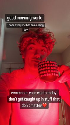 a man holding a cup in front of his face with the caption'good morning world, i hope everyone has an amazing day '