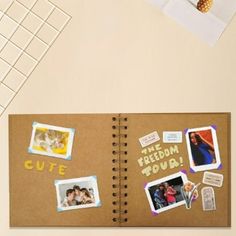 an open notebook with pictures on it next to a computer keyboard and mouse, which has the words cute cutie written in yellow