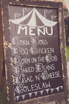 a chalkboard sign with some writing on it that says menu for dogs, bbq chicken, corn on the cob and baked beans mac n cheese coleslaw