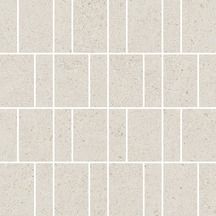 a white tile wall with squares on it