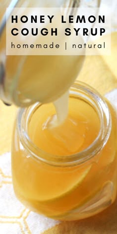 honey lemon cough syrup is being poured into a jar