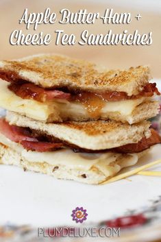 an apple butter - ham and cheese tea sandwich is stacked on top of each other