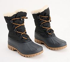 a pair of black boots with brown laces and fur lined around the soles