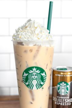 a starbucks drink with whipped cream on top