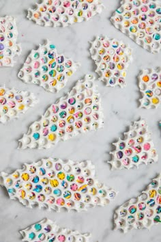 the cookies are decorated with sprinkles and frosting