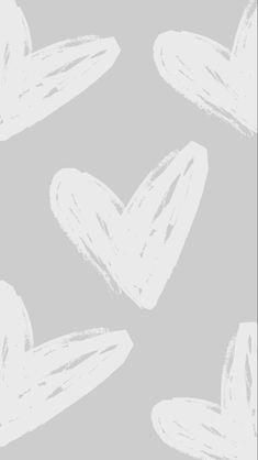 a gray and white background with hearts drawn on it's sides in different sizes