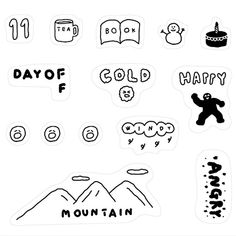 some stickers that are on the side of a white paper with words and symbols