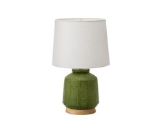 a green table lamp with a white shade on the top and wooden base, against a white background