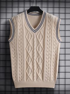 Made from premium materials, this versatile vest offers comfort and style, perfect for layering or wearing alone. Ideal for both casual and semi-formal occasions.  #MensFashion #CableKnitVest #VNeckSweater #CasualStyle #LayeringPiece #TimelessDesign #ComfortableWear #VersatileFashion Long Knitted Vest, 1920s Mens Fashion, Woolen Clothes, Cable Knit Vest, Vest Shirt, Simple Trendy Outfits, Knit Vest, V Neck Sweater