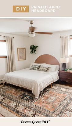 a bed sitting on top of a rug in a bedroom