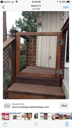 a screen shot of a wooden deck with railings and doors on the bottom level