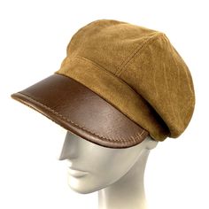 Baker boy cap made of cotton velour and genuine brown leather visor. Inspired by the early 20th century newspaper delivery boys. Its large visor protects us from the sun, cold and rain. The length of the visor is 6 centimeters. The interior is made of a cotton lining The back of the cap has a small eco-leather belt to adjust the measurement up to three centimeters less. For its production we use top quality real leather, reinforcements to give consistency to the hat and top sewing threads. In ou Vintage Brown Beret Flat Cap, Vintage Brown Beret For Winter, Brown Fall Baseball Cap For Outdoor, Brown Winter Baseball Cap, Brown Vintage Winter Beret, Adjustable Brown Baseball Cap For Fall, Brown Adjustable Baseball Cap For Fall, Classic Brown Baseball Cap For Winter, Classic Brown Beret With Curved Brim