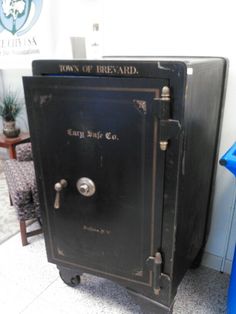 an old fashioned safe is sitting on the floor