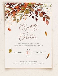 an autumn wedding card with leaves on it