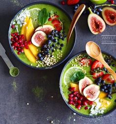 two bowls filled with different types of fruit