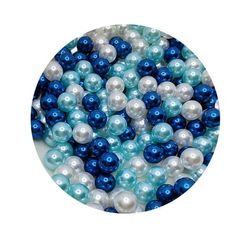 blue and white pearls are arranged in a circle