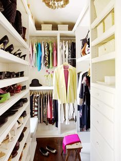 the closet is full of shoes and clothes