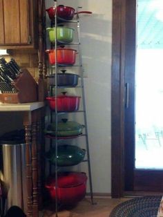 a stack of bowls sitting on top of a kitchen counter