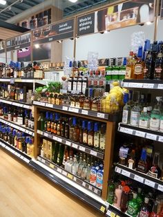 a store filled with lots of bottles of alcohol