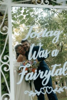 a man and woman standing next to each other in front of a mirror with the words today was a fairy tale written on it