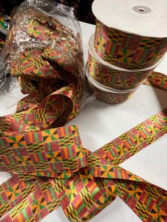 3 yards of african Ankara kente ribbon. Made with polyester material Two sided african print ribbon Please contact me for any questions about this ribbon NOTE; This ribbon is not wired. African Fabric Accessories, African Ankara, Bracelet Display, Fabric Accessories, African Wax Print, Printed Ribbon, African Print Fabric, Ankara Fabric, Fabric Strips