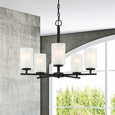 Simple lines and etched rounded shapes contrast perfectively with the bold black or sleek metallic finishes of our Carmine collection. This minimalistic style adds a fresh aesthetic with a softer and more relaxed approach to today’s Modern interiors. Made from durable steel for long-lasting style in your home. Designers Fountain Carmine 5-Light Matte Black Modern/Contemporary Chandelier | D239M-5CH-MB Modern Contemporary Chandelier, Fresh Aesthetic, Minimalistic Style, Contemporary Chandelier, Modern Interiors, Bold Black, Simple Lines, Candle Sconces, Modern Interior