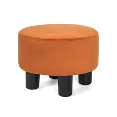 an orange ottoman with black legs