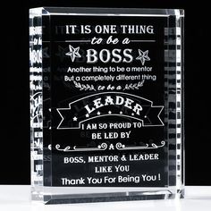 a clear glass plaque that says it is one thing to be boss