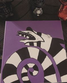 a purple and black painting with a white snake on it