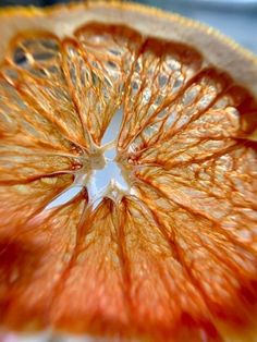 an orange is cut in half and ready to be eaten