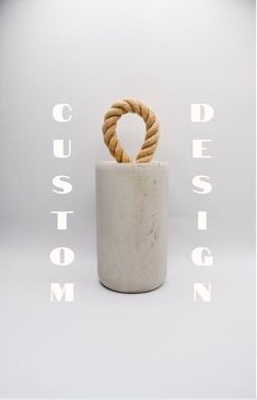 a white vase with a rope wrapped around it and the words custom written in front of it