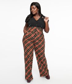 These fabulous 1930s style plus size suspender pants from Unique Vintage, boasting a marvelous silhouette in a black and rust plaid print throughout the woven fabric. The wide banded high waist cinched in with a darling button up front and secured by adjustable suspender straps. Complete with side pockets.Available in sizes XS-5X while supplies last. 1930s Style, Vintage Plus Size, Suspender Pants, Vintage Inspired Fashion, 1930s Fashion, Jumpsuit Trousers, Vintage Pants, Plaid Print, Luxury Fabrics