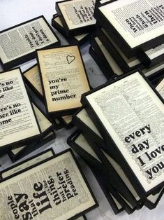 there are many framed books with words on them