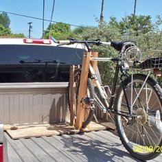 a truck with a bike on the back of it's flatbed and text that reads a cost - effective way to make a bike rack simple instructions