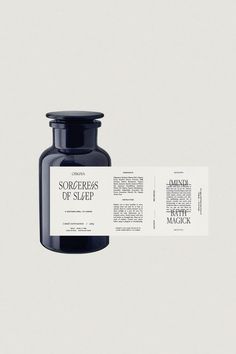 a bottle of sleep next to a piece of paper