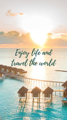 the words enjoy life and travel the world are in front of an image of water