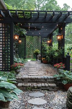 an outdoor patio with stone steps and potted plants on either side, surrounded by greenery