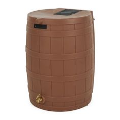 a large brown barrel sitting on top of a white floor