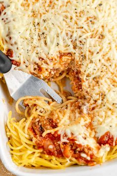 a close up of spaghetti in a pan with the words spaghetti pie written below it