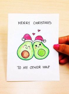 someone is holding up a christmas card with two avocados on it and the capt says, merry christmas to my other half