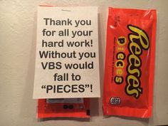 a candy bar with a note attached to it and an ad on the back side