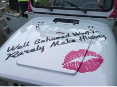 a white truck with pink lipstick painted on it's hood that says well shared history