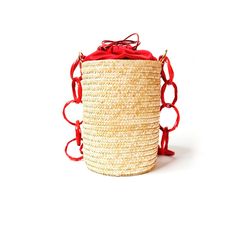 A traditional raffia bucket, simple but more than basic.This style can be worn from day to night, from beach to city, en route to the sand or a seaside dinner.Enjoy it!  21cm bucket’s high · 17 cm width · 40 cm belt  Materials: Raffia, Silk/Satin, Calf leather -- PRODUCT CARE  This item’s accessories are enterely hand Natural Fiber Bucket Bag, Summer Beach Bucket Bag, Handmade Bucket Bag For Vacation, Natural Bucket Bag With Bamboo Handle, Woven Bucket Bag For Beach, Straw Bucket Bag With Adjustable Strap, Bucket Straw Bag With Adjustable Strap For Beach Season, Adjustable Strap Bucket Straw Bag, Natural Color Bucket Beach Bag