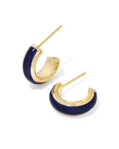 Amp up your earring game with the Ainsley Gold Huggie Earrings in Navy Enamel. The minimal huggie style goes bold with hand-painted enamel embellishments, and the sides feature our signature hoofprint detailing for added texture. Lightweight enough for all-day wear, this pair will take any look from everyday to occasion ready. Metal 14k Yellow Gold Over Brass Material Navy Enamel Closure Ear Post Size 0.59"L X 0.56"W StationDue to the one-of-a-kind nature of the medium, exact colors and patterns Navy Blue Jewelry, Hoof Print, Gold Huggie Earrings, Huggie Earrings Gold, Preppy Jewelry, Kendra Scott Earrings, Jewelry Accessories Ideas, Jewelry Essentials, Jewelry Lookbook