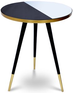 a black and white table with gold legs