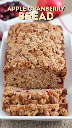 an apple cranberry bread on a white plate