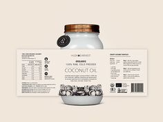 a jar of coconut oil next to a label