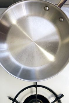 a frying pan sitting on top of a burner