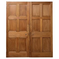 two wooden doors are open and closed on a white background the door is made of wood